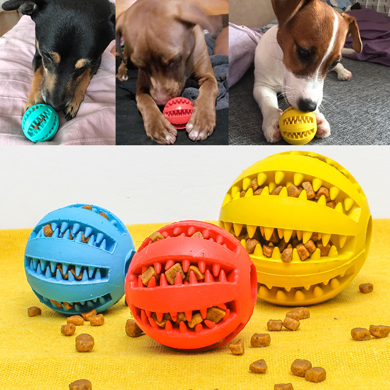 Colorful dog treat balls with textured designs for interactive play and feeding